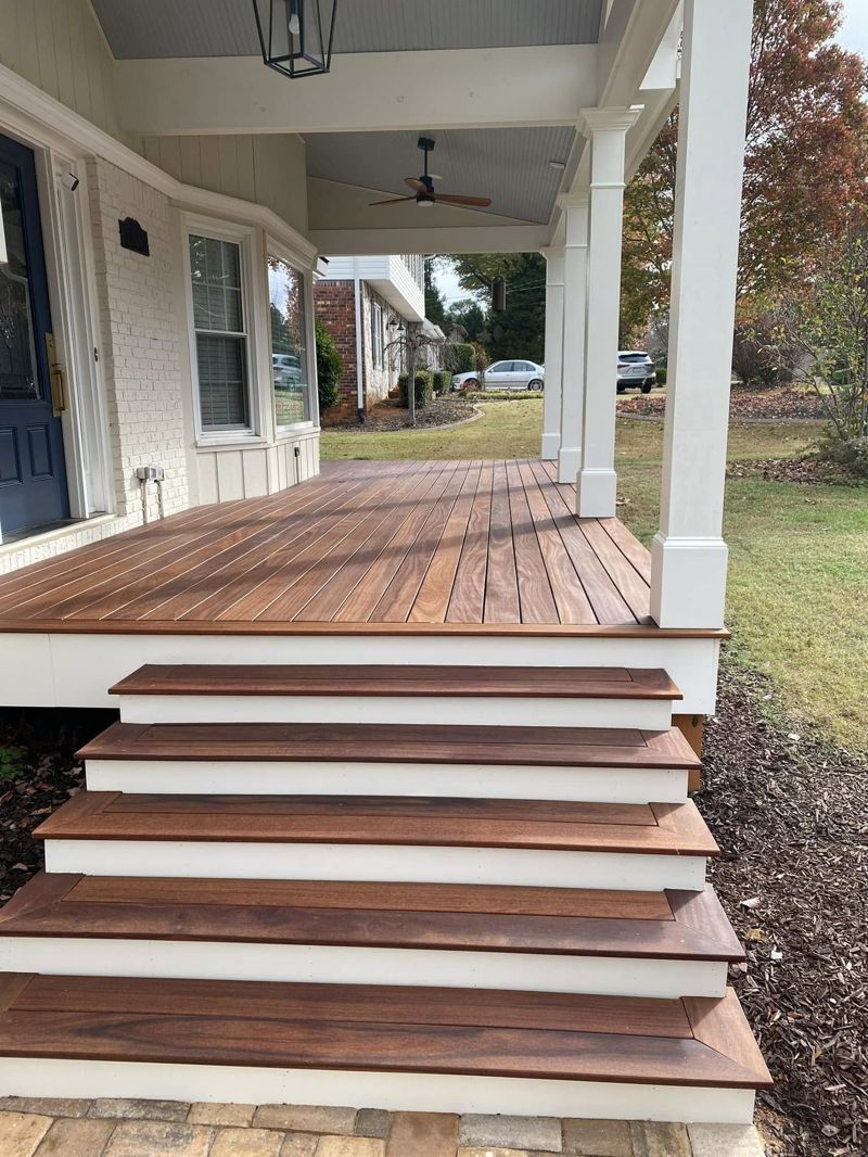 Hardwood stair treads with mitered nosing and white-painted risers