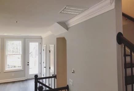 Crown molding detail at corner showing clean profile