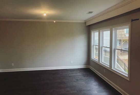 Crown molding in bedroom with consistent ceiling line