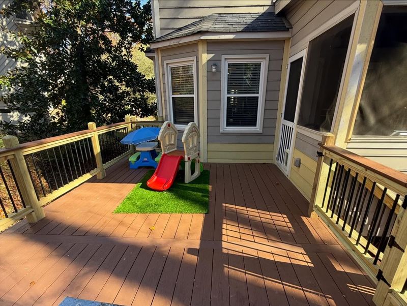 Rebuilt deck with clean unified layout and modern railing