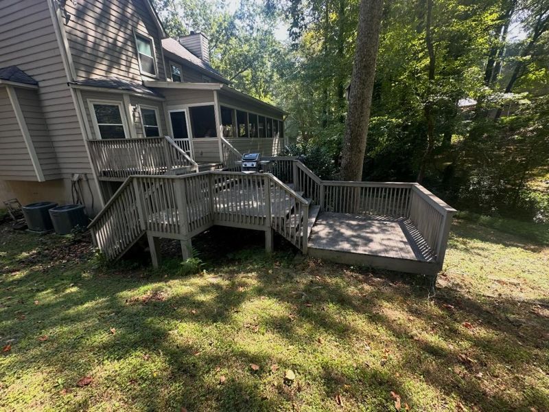Weathered multi-level deck in Marietta before renovation