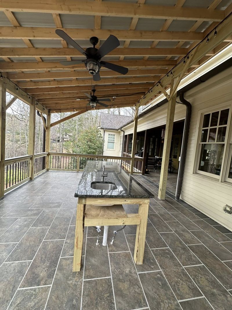 Granite-topped custom wet bar with built-in sink