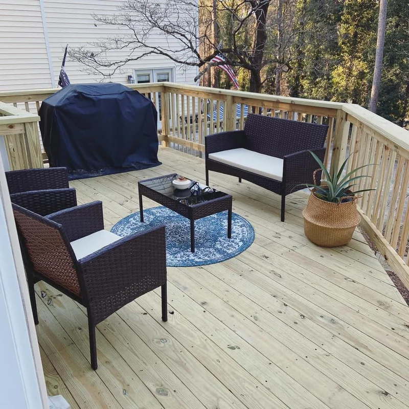 Rebuilt pressure-treated deck in Roswell with fresh decking and secure railing system