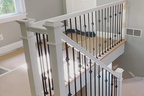 Staircase railing installation in Roswell with clean modern profile