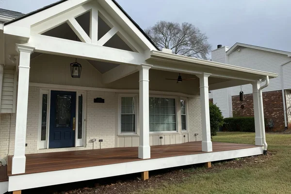 Custom front porch with hardwood decking and beadboard ceiling