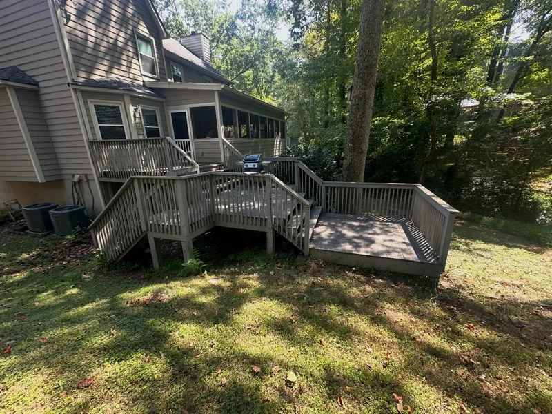 Weathered multi-level deck in Marietta before renovation